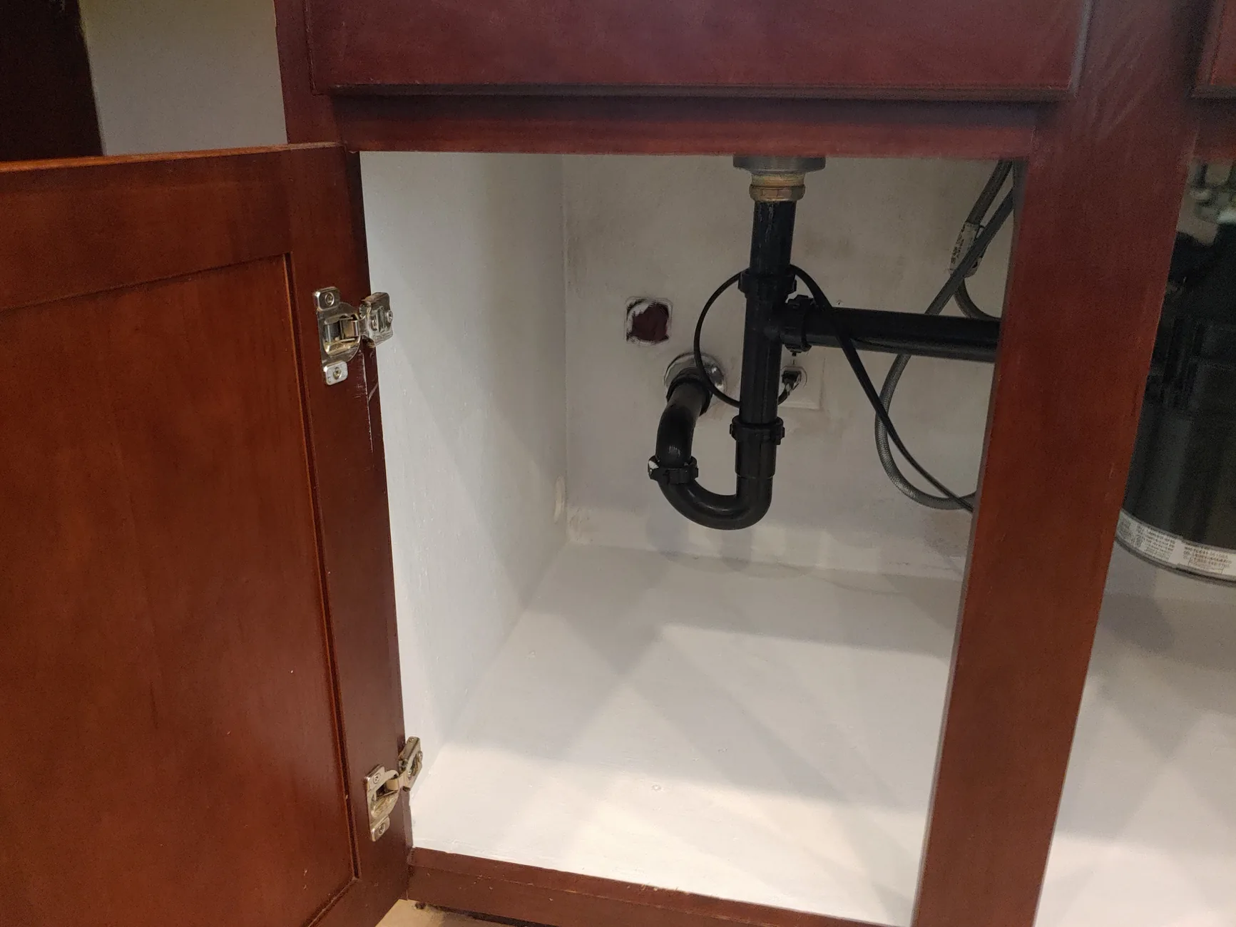 Completed water-damaged cabinet repair